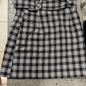 Black and white checkered skirt with belt size 2